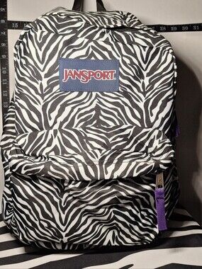 jansport backpack leopard print Half Pint FX Mini the leo dots Half Pint by Jansport will deliver on style JanSport Leopard Rose Half Pint
